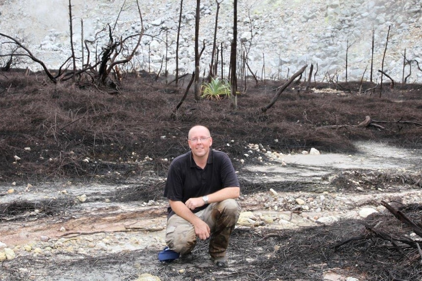 Rob Davis in front of a volcano in New Britain.