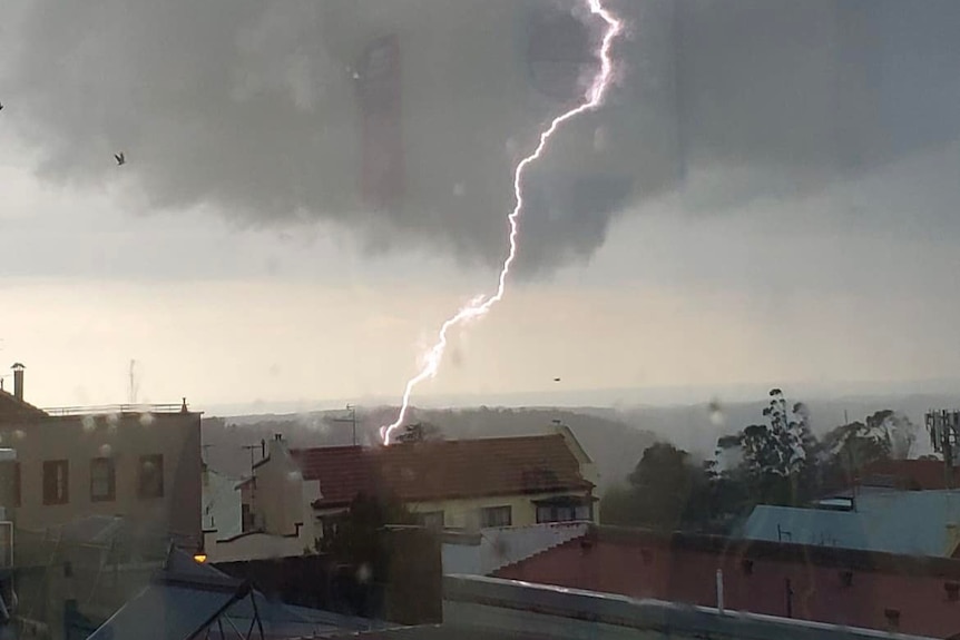 Lightning strike near home roofs in Blue Mountains