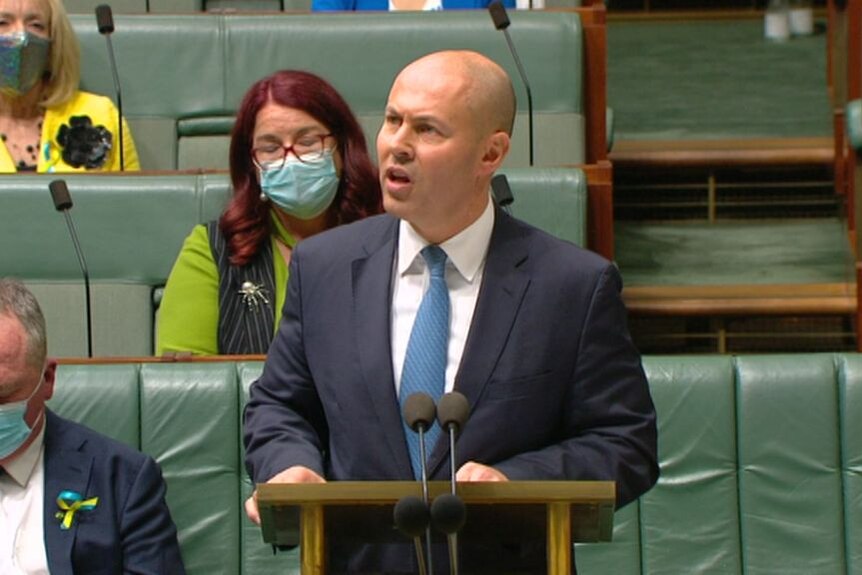A man gives a speech in parliament.