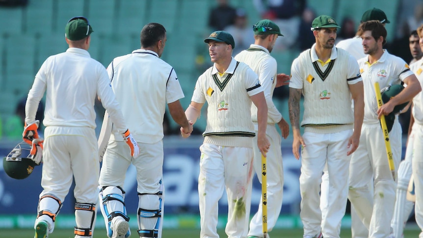 Australia and India players shake hands after day five