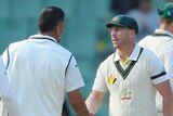 Australia and India players shake hands after day five