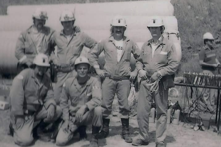 Historical image of a group of miners.