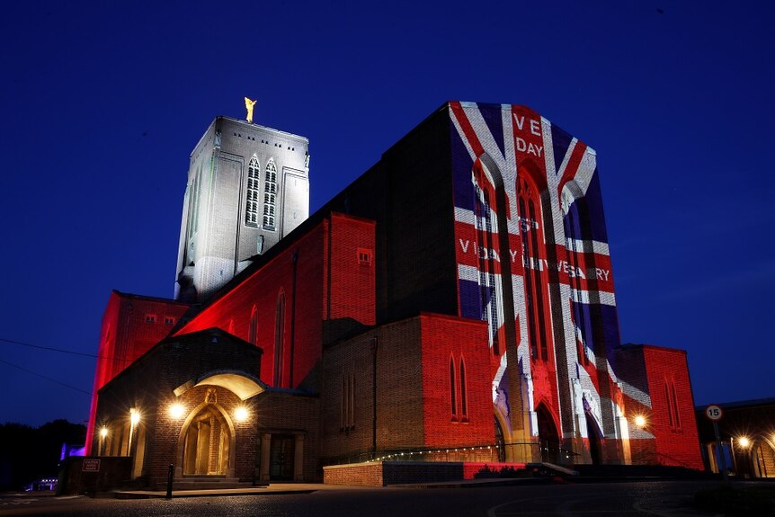 A Union Jack is displayed in lights on Guildford Cathedral