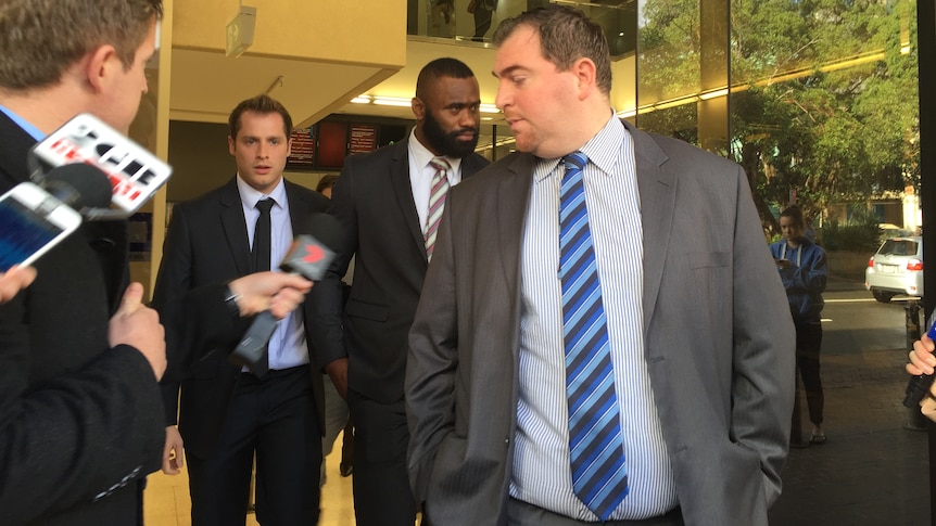 Parramatta Eels player Semi Radradra leaving court with his manager and friend.