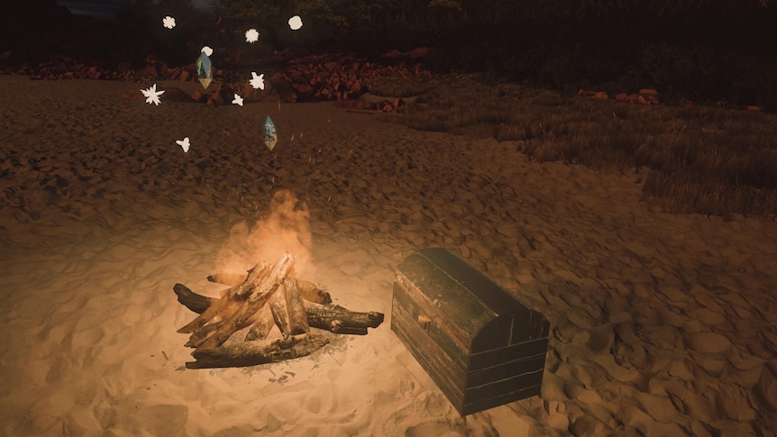 A bonfire on a beach with stars and a wooden chest