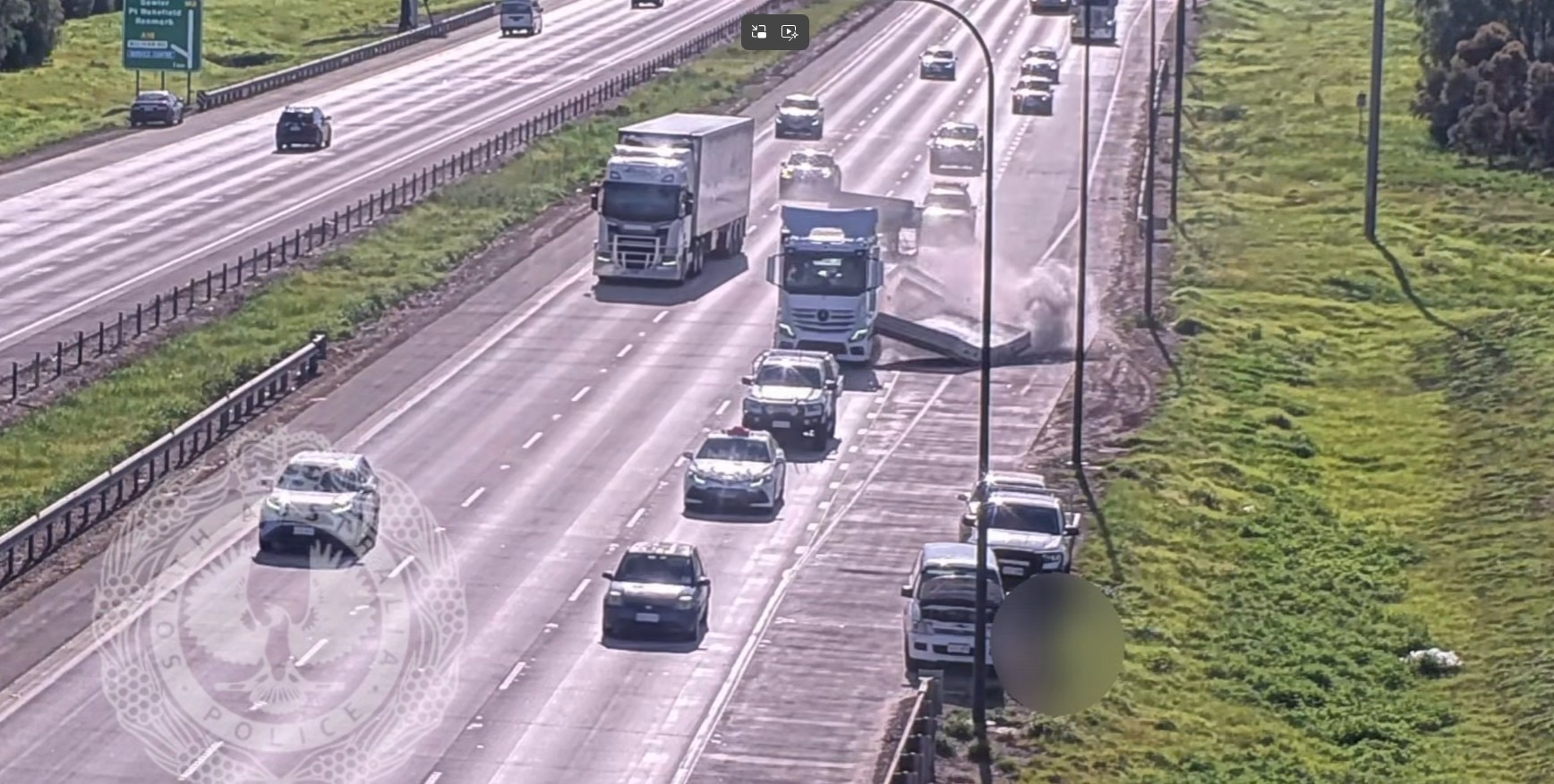 Pedestrians 'fortunate to be alive' after truck loses load on highway
