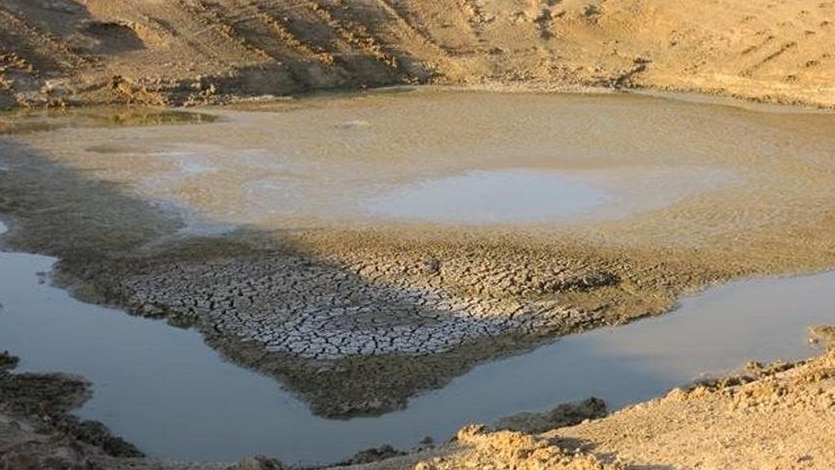 Dry dam at Sunbury Station near Isisford western Qld