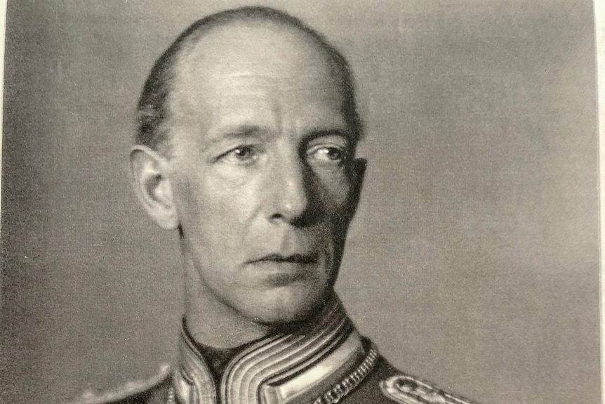 A black and white portrait of a man in a German army uniform