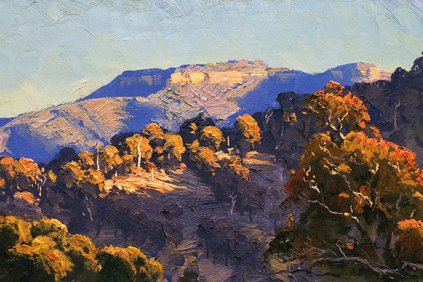 A painting of a mountainous landscape.