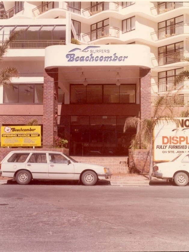 Exterior of the Beachcomber apartments with a car parked outside