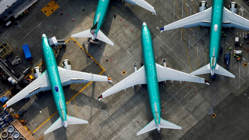 An aerial photo shows Boeing 737 MAX airplanes parked on the tarmac at the Boeing Factory in Renton, Washington.