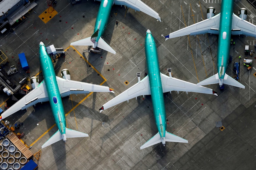 An aerial photo shows Boeing 737 MAX airplanes parked on the tarmac at the Boeing Factory in Renton, Washington.