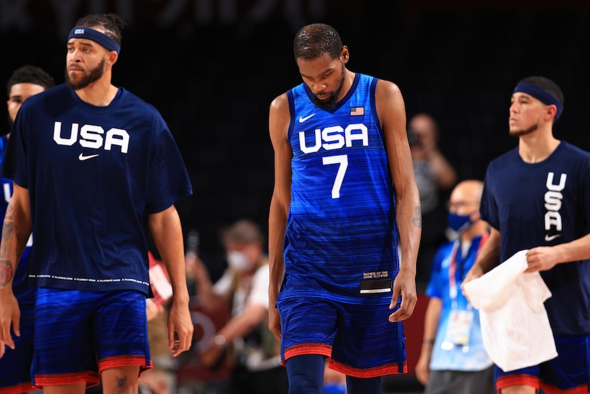 Team USA basketballer Kevin Durant hangs his head as he walks off the court in Japan.