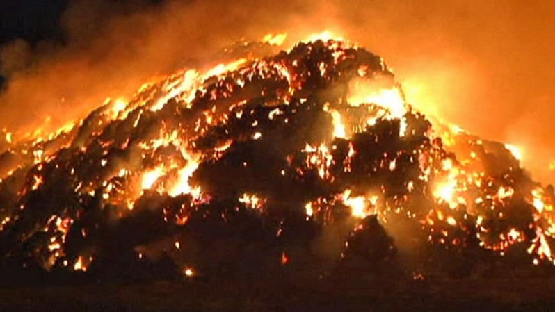 Firefighters tackle big hay blaze