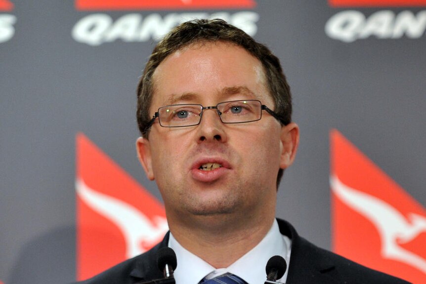 Qantas CEO Alan Joyce speaks to the media during a press conference in Sydney.
