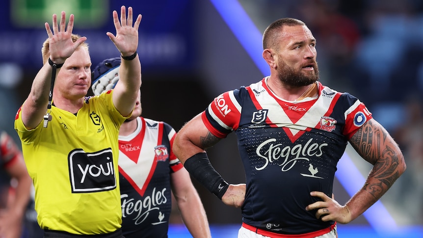 Jared Waerea-Hargreaves is sent to the sin bin by a referee during a Sydney Roosters NRL game.