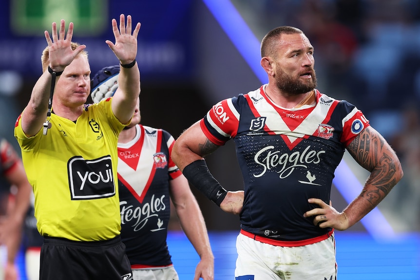 Jared Waerea-Hargreaves is sent to the sin bin by a referee during a Sydney Roosters NRL game.