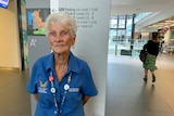 82-year-old Pamela Malzard standing at Gold Coast University Hospital. 