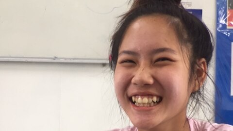 Khin Nin Ye smiles.