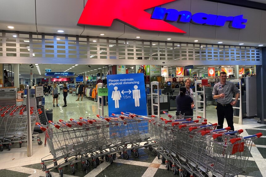 Roof leaks at Kmart store with water seen on floor.