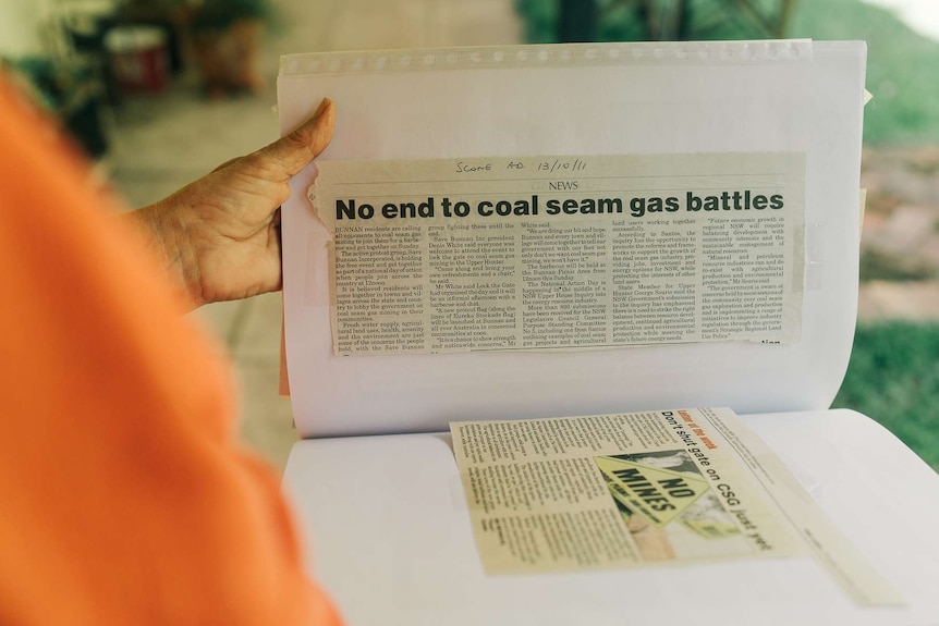 A newspaper clipping reading 'no end to coal seam gas battles'