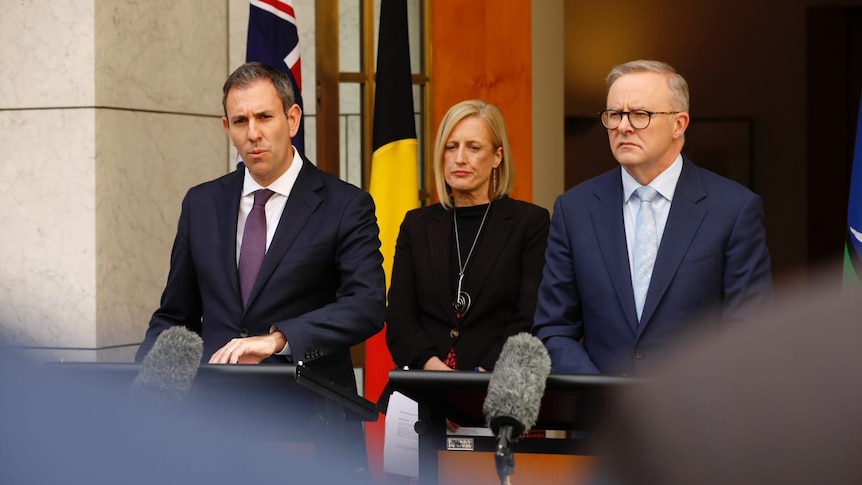 Treasurer Jim Chalmers, Finance Minister Katy Gallagher and Prime Minister Anthony Albanese in the courtyard at Parliament House