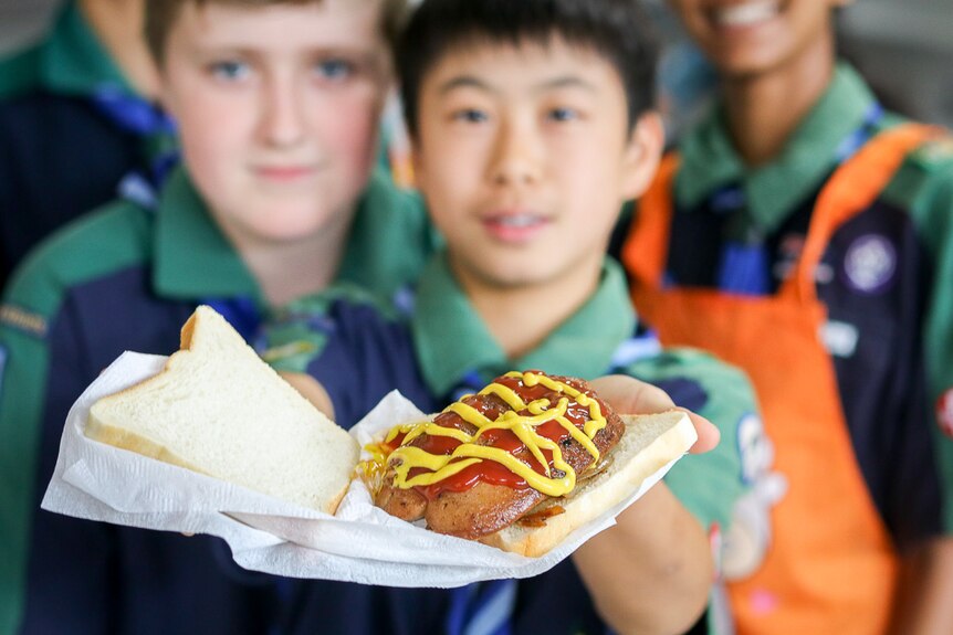 Scouts raise money with sausage sizzle