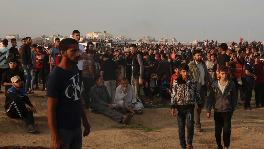 Protesters gather near the fence of Gaza Strip border with Israel during a protest east of Gaza City.