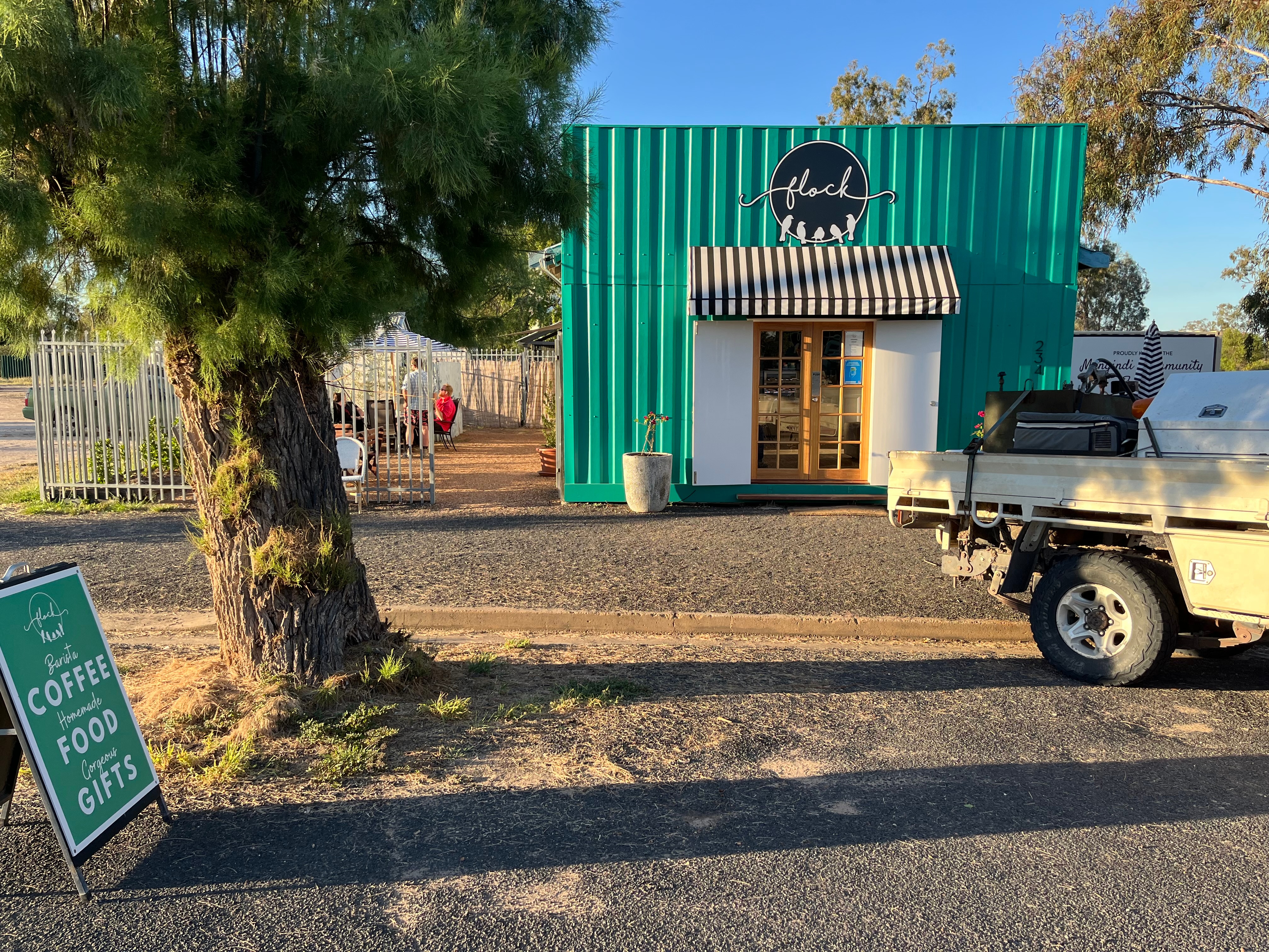 Flock cafe's exterior is a vibrant green. 