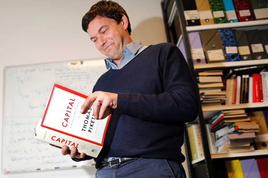 French economist Thomas Piketty reads his book, Capital in the 21st Century