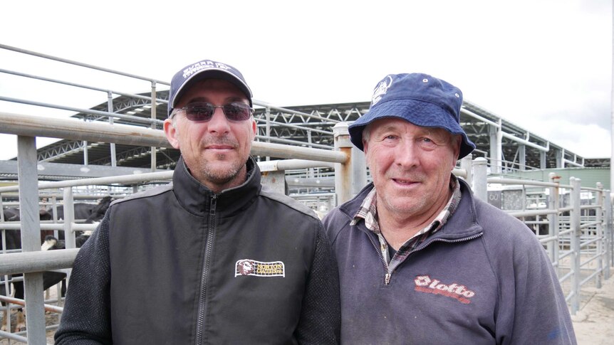 Brad and Jim Missen stand together at the Sale saleyards.