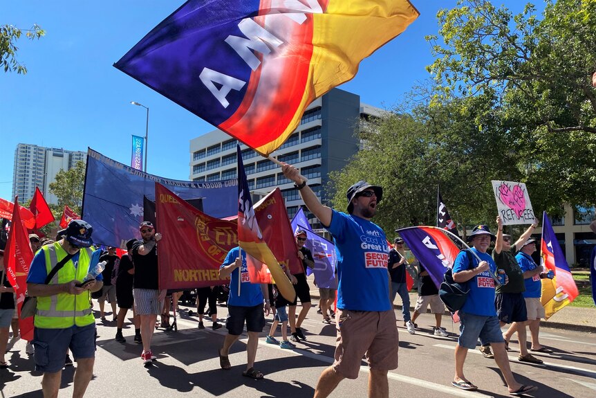 workers marching at a protest