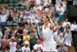 Karolina Pliskova celebrates defeating Mihaela Buzarnescu at Wimbledon on July 6, 2018.