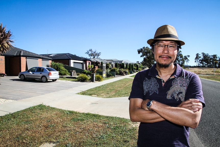 Melbourne University lecturer Dr Masa Noguchi standing near a sub-division development in central Victoria.