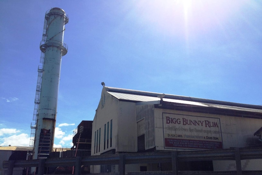 Looking up at the outside of a sugar mill.