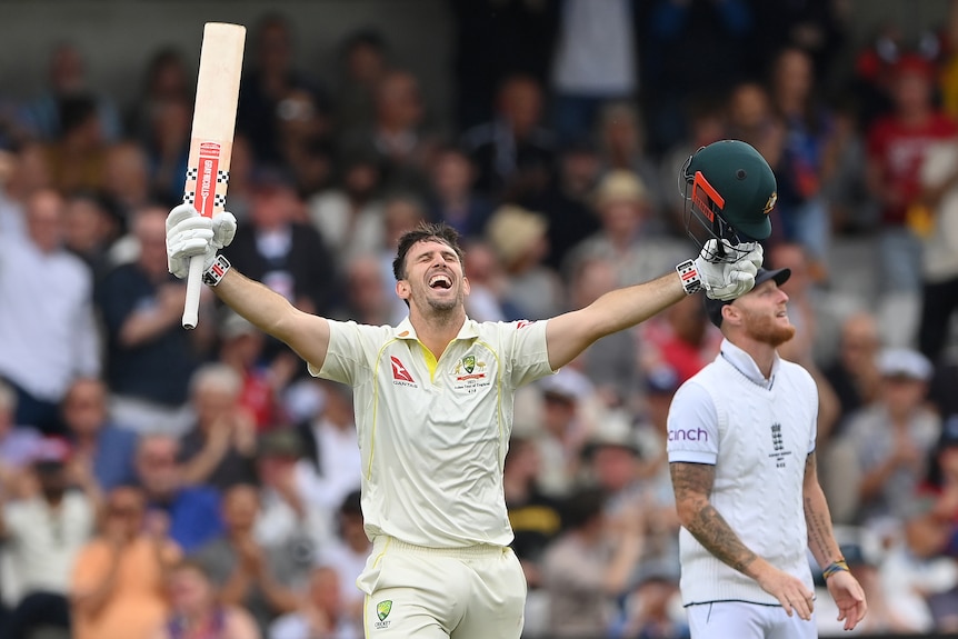 Mitch marsh holds up his bat