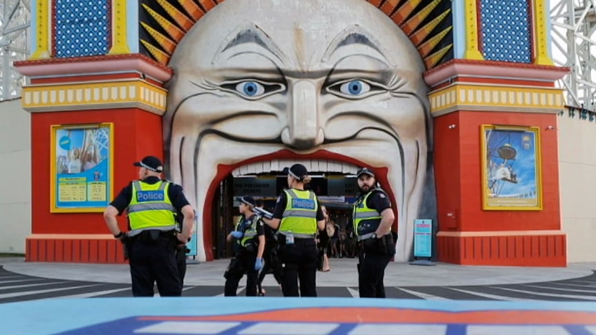 Police outside Luna Park in St Kilda.