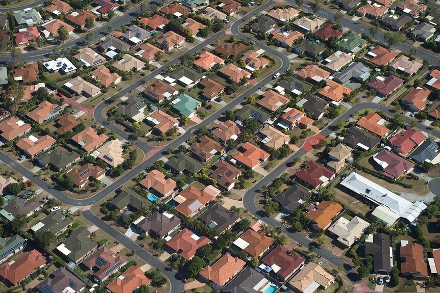 Suburban sprawl is seen to the north of Brisbane, Wednesday, Oct. 23, 2014.