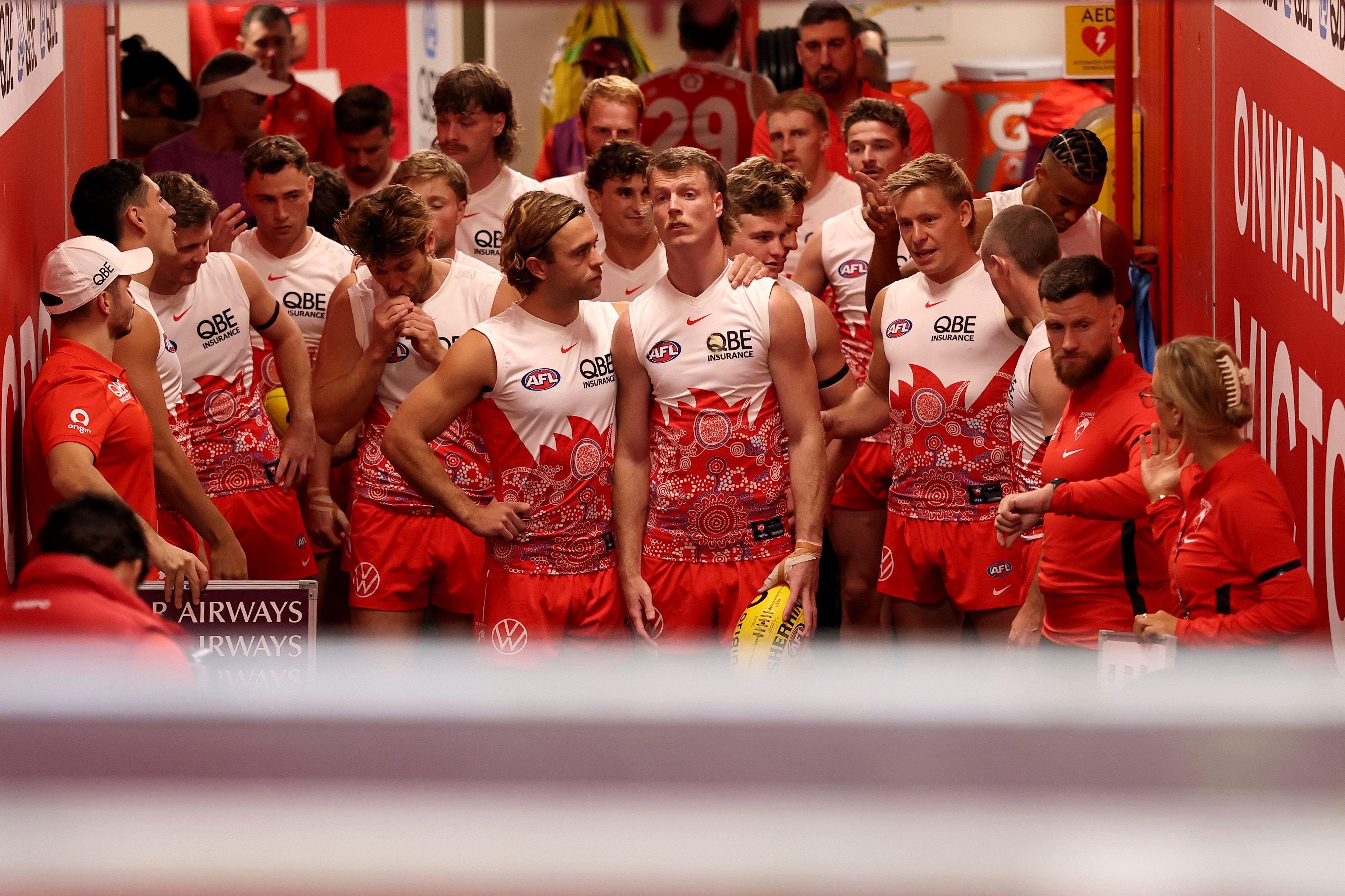 How Swans midfielder is supporting banned housemate amid trade rumours