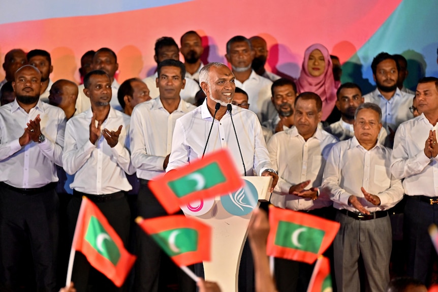 Maldives President Mohamed Muizzu addresses his supporters during celebrations.