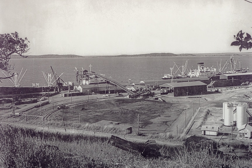 Historic black and white photo of Gladstone Port coal terminal, date unknown, Queensland, November 2021. 