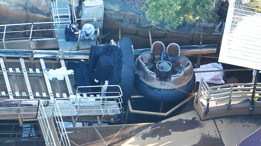 Queensland Emergency Service personnel are seen at Thunder River Rapids ride.