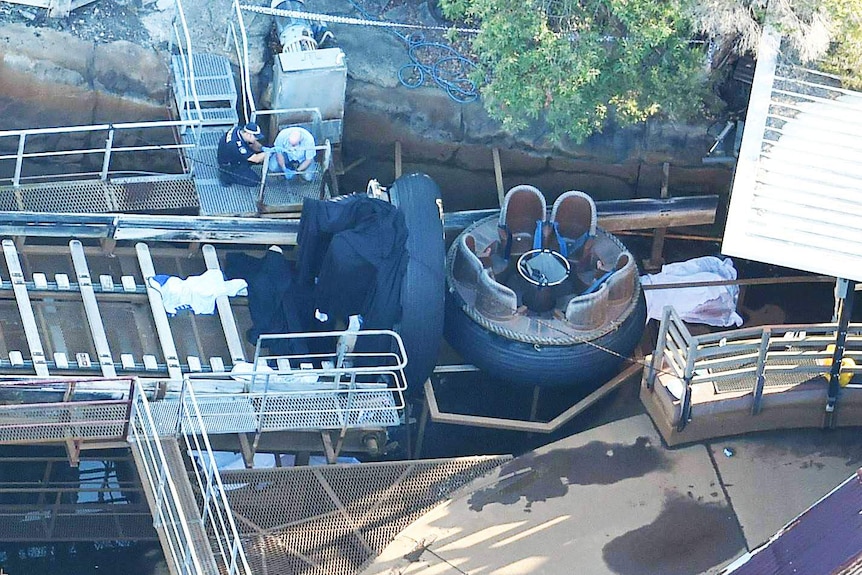 Queensland Emergency service personnel are seen at the Thunder River Rapids ride.