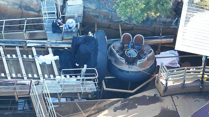 Queensland emergency service personnel are seen at Thunder River Rapids ride.