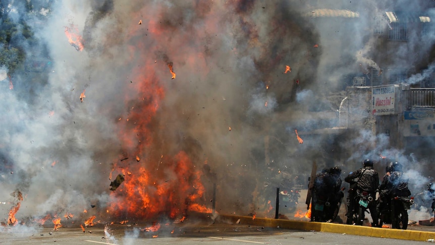 Clashes break out in Venezuela's capital Caracas.