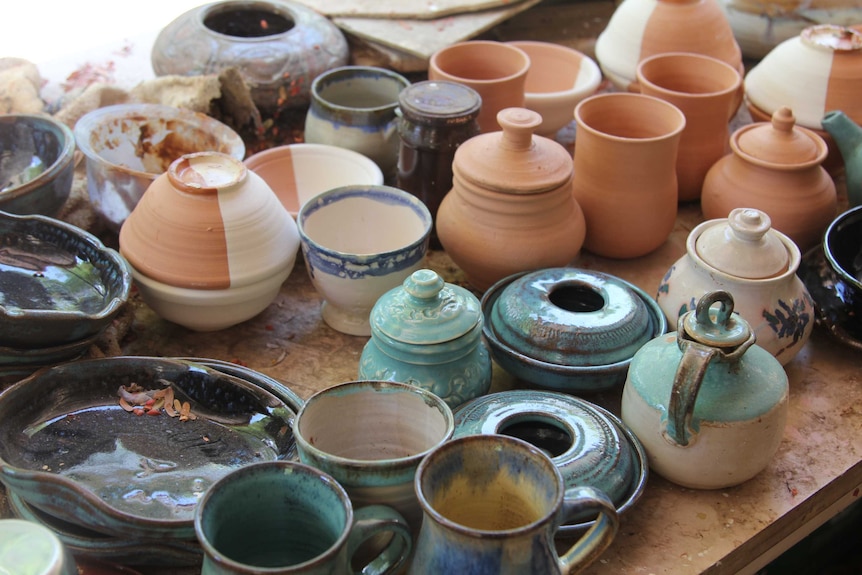 A collection of half-finished pots and bowls.