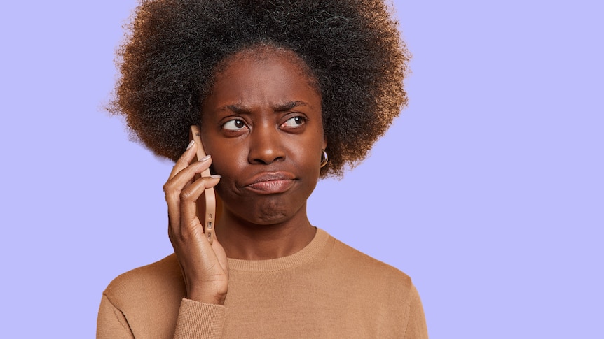 woman holds phone to her ear looking confused with purple background