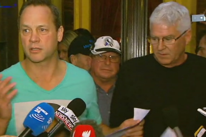 Church sex abuse survivors Peter Blenkiron (green shirt) and Philip Nagle (right, black shirt) address media in Rome
