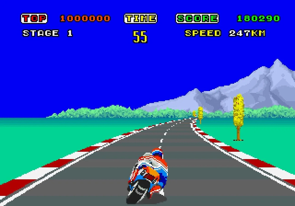 In a scene from a video game a motorbike racer rides on racing track in third person perspective on a clear blue day.