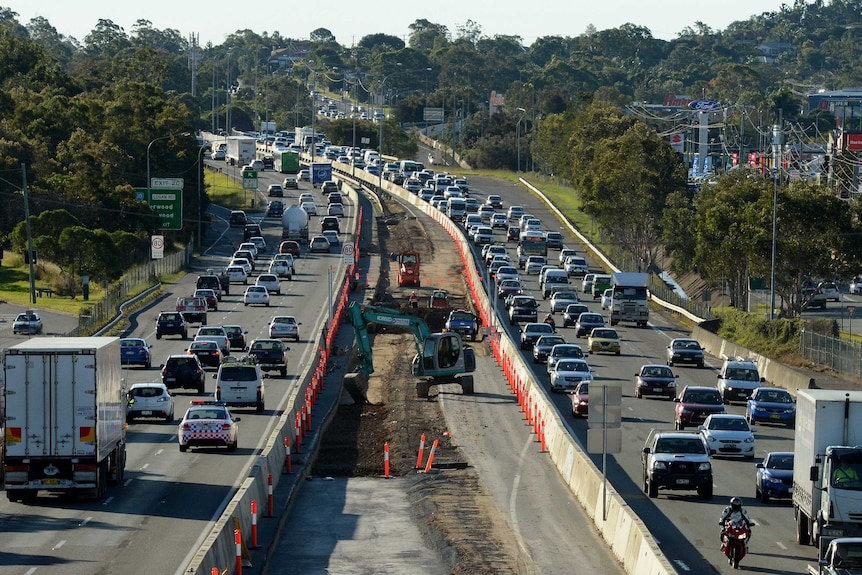 Work being carried out on the widening of the M1 Pacific Highway near Springwood, south of Brisbane, Monday, June 24, 2013.